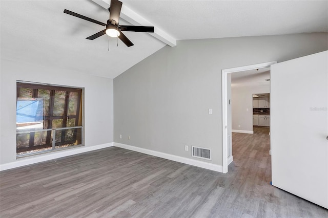 5039 Jamaica Cir Unit 10, Orlando, FL 32808 - spare room featuring wood finished floors, ceiling fan, and baseboards