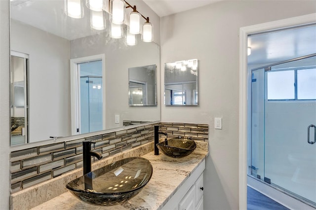 5039 Jamaica Cir Unit 10, Orlando, FL 32808 - full bathroom featuring a shower stall and double vanity