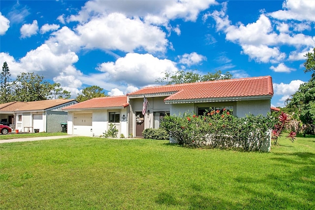 10148 Eventide Ct, Orlando, FL 32821 - mediterranean / spanish-style house featuring a tile roof, a garage, concrete driveway, a front lawn, and stucco siding