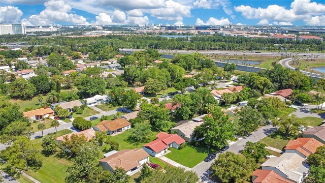 10148 Eventide Ct, Orlando, FL 32821 - aerial perspective of suburban area with a large body of water