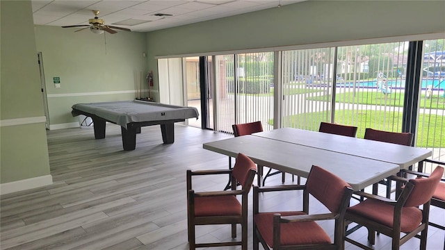 10148 Eventide Ct, Orlando, FL 32821 - game room featuring baseboards, ceiling fan, a paneled ceiling, billiards table, and light wood-type flooring