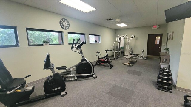 10148 Eventide Ct, Orlando, FL 32821 - workout room featuring a drop ceiling