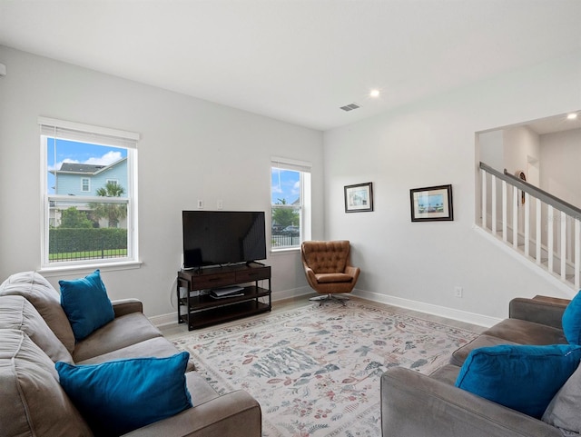 6875 Bridgman St, Orlando, FL 32827 - living area with recessed lighting and baseboards