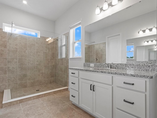 6875 Bridgman St, Orlando, FL 32827 - bathroom featuring a walk in shower, plenty of natural light, and vanity