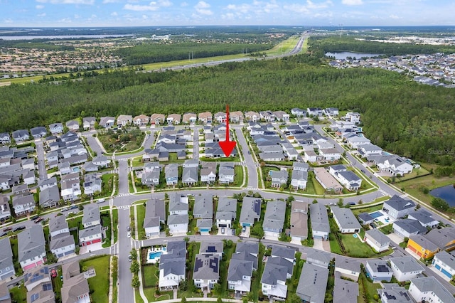 6875 Bridgman St, Orlando, FL 32827 - aerial view of property and surrounding area featuring a large body of water and nearby suburban area