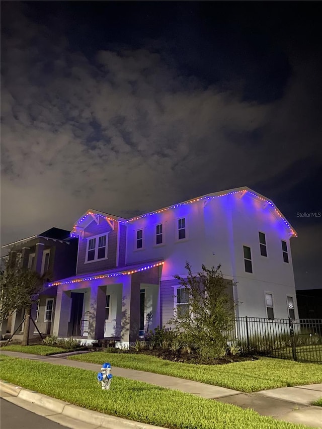 6875 Bridgman St, Orlando, FL 32827 - view of front of home with fence and stucco siding
