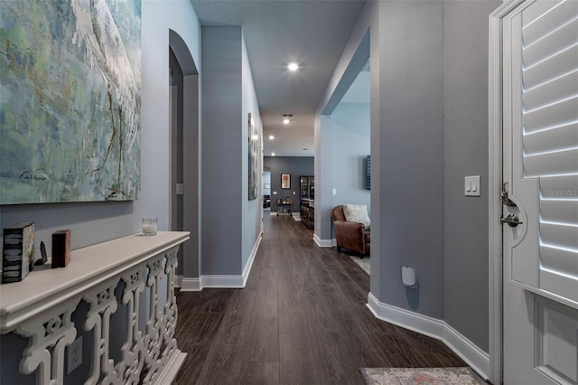 1212 Civitas Way, Winter Garden, FL 34787 - corridor with dark wood-type flooring, baseboards, arched walkways, and recessed lighting