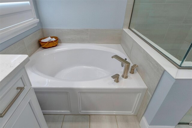 1212 Civitas Way, Winter Garden, FL 34787 - bathroom featuring a garden tub and vanity