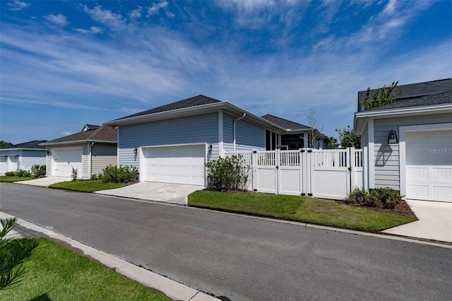 1212 Civitas Way, Winter Garden, FL 34787 - view of property exterior with a gate, a garage, and concrete driveway