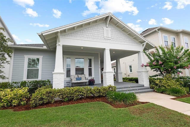 1212 Civitas Way, Winter Garden, FL 34787 - craftsman-style home with a porch and a front yard
