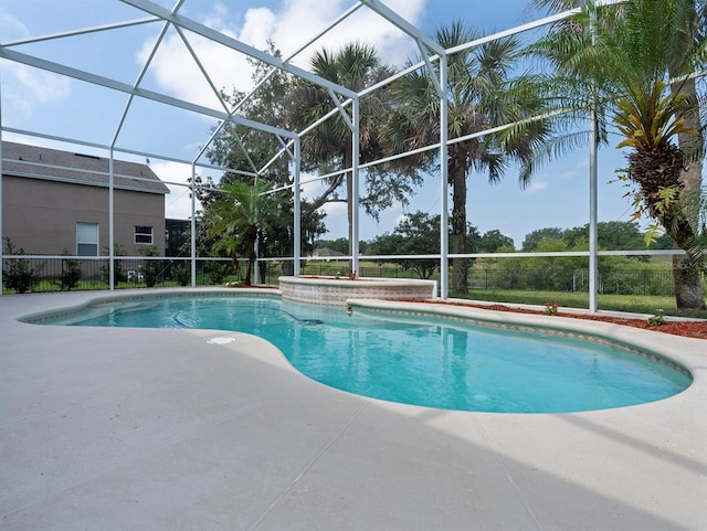 3840 Caledonia Ave, Apopka, FL 32712 - outdoor pool featuring a patio and glass enclosure