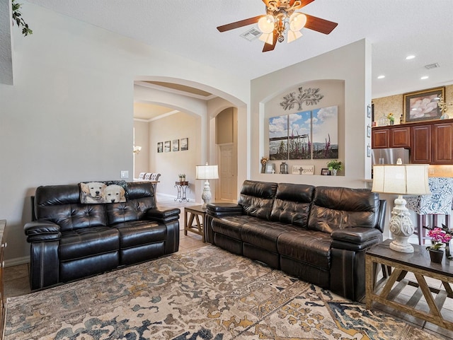 3840 Caledonia Ave, Apopka, FL 32712 - living area featuring ceiling fan, arched walkways, and recessed lighting