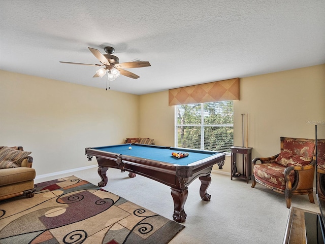 3840 Caledonia Ave, Apopka, FL 32712 - game room with billiards table, a ceiling fan, light colored carpet, a textured ceiling, and baseboards