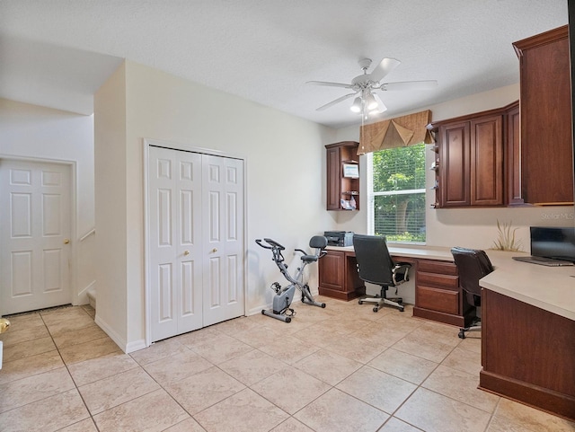 3840 Caledonia Ave, Apopka, FL 32712 - office space with ceiling fan, light tile patterned floors, and built in study area