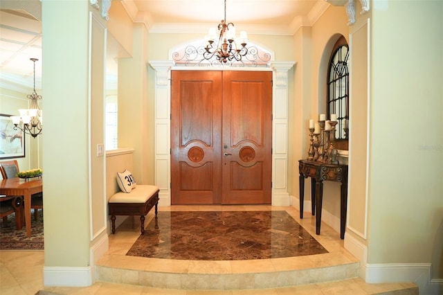 11013 Ullswater Ln, Windermere, FL 34786 - foyer with a chandelier, crown molding, arched walkways, and baseboards