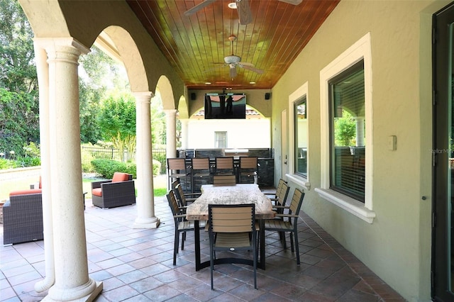 11013 Ullswater Ln, Windermere, FL 34786 - view of patio / terrace with a ceiling fan, fence, an outdoor bar, and outdoor dining space