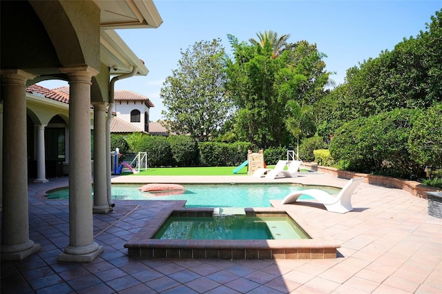 11013 Ullswater Ln, Windermere, FL 34786 - view of pool with a patio area and a pool with connected hot tub