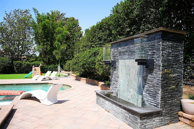 11013 Ullswater Ln, Windermere, FL 34786 - swimming pool featuring a patio area
