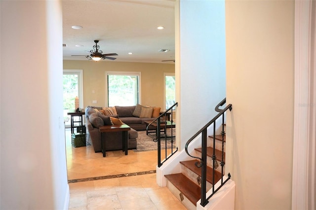11013 Ullswater Ln, Windermere, FL 34786 - living room with ceiling fan, recessed lighting, inlaid floor details, stairs, and light tile patterned floors