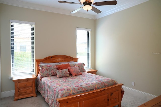 11013 Ullswater Ln, Windermere, FL 34786 - bedroom featuring light colored carpet, ornamental molding, baseboards, and a ceiling fan