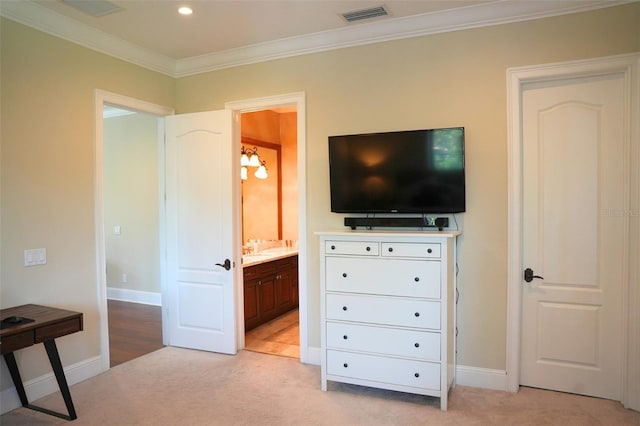 11013 Ullswater Ln, Windermere, FL 34786 - bedroom with light carpet, ornamental molding, recessed lighting, baseboards, and ensuite bathroom