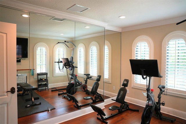 11013 Ullswater Ln, Windermere, FL 34786 - workout area with plenty of natural light, wood finished floors, crown molding, baseboards, and recessed lighting