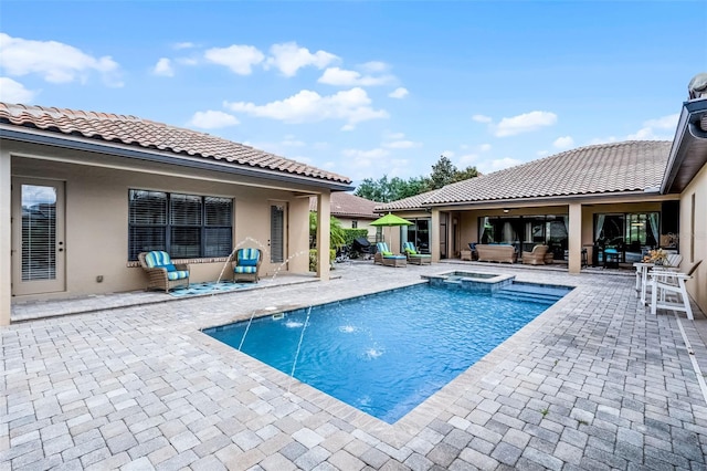 11755 Waterstone Loop Dr, Windermere, FL 34786 - view of pool with an outdoor hangout area, a pool with connected hot tub, and a patio area