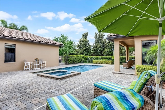 11755 Waterstone Loop Dr, Windermere, FL 34786 - view of swimming pool featuring a patio, a pool with connected hot tub, and fence