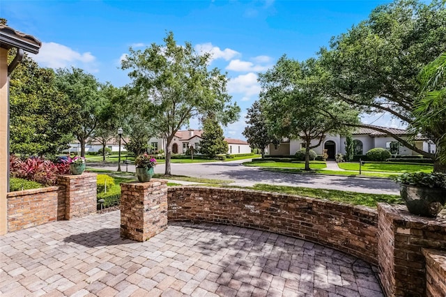 11755 Waterstone Loop Dr, Windermere, FL 34786 - view of patio featuring a residential view