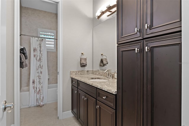 11755 Waterstone Loop Dr, Windermere, FL 34786 - bathroom with vanity, tile patterned flooring, shower / bath combo, and baseboards