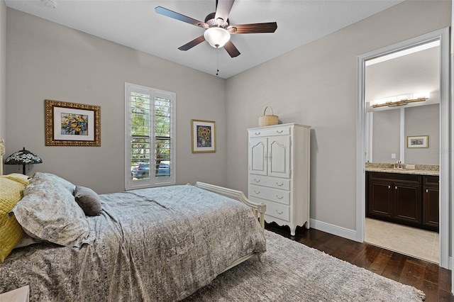 11755 Waterstone Loop Dr, Windermere, FL 34786 - bedroom featuring a sink, hardwood / wood-style floors, baseboards, ensuite bathroom, and ceiling fan