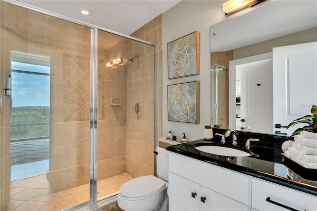 101 S Eola Dr Unit 810, Orlando, FL 32801 - bathroom featuring a shower stall, vanity, toilet, and recessed lighting