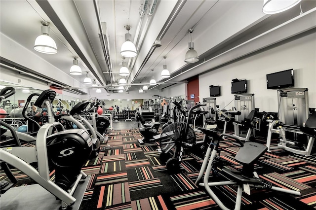 101 S Eola Dr Unit 810, Orlando, FL 32801 - exercise room featuring carpet flooring