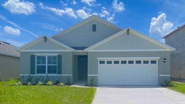 33612 Seattle Slew Dr, Sorrento, FL 32776 - craftsman-style house with concrete driveway, an attached garage, a front lawn, and stucco siding