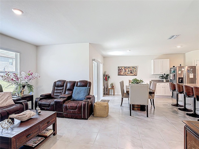 3354 Aruba Way, Haines City, FL 33844 - living area with light tile patterned floors and recessed lighting