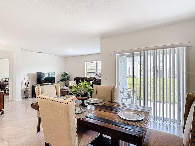 3354 Aruba Way, Haines City, FL 33844 - dining space with light tile patterned flooring
