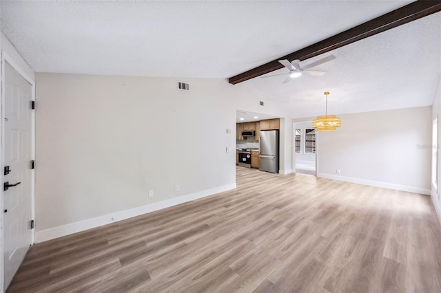1957 Deloy Dr, Daytona Beach, FL 32119 - unfurnished living room featuring light wood-type flooring, ceiling fan, and baseboards
