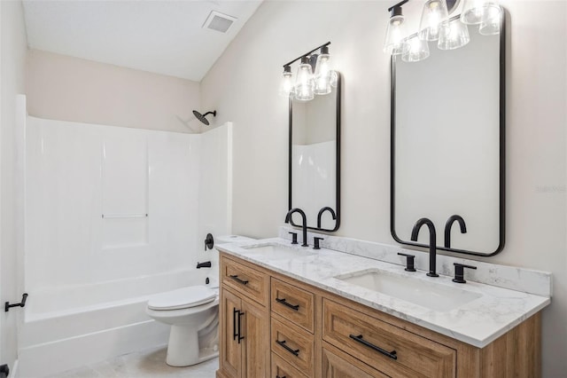 1957 Deloy Dr, Daytona Beach, FL 32119 - full bath with toilet, double vanity, and shower / bathtub combination