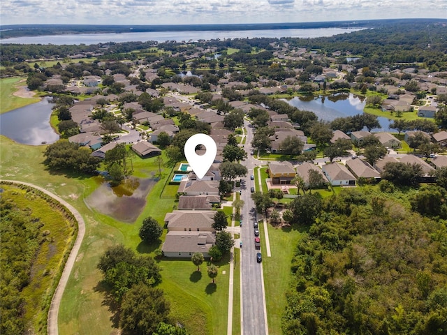 9563 Myrtle Creek Ln, Orlando, FL 32832 - aerial perspective of suburban area with a nearby body of water