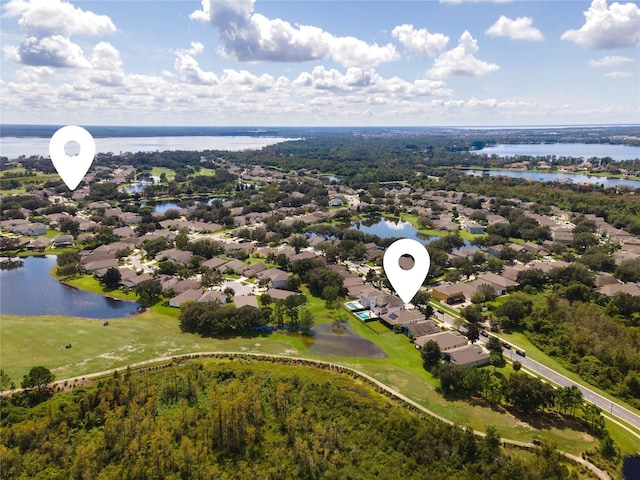 9563 Myrtle Creek Ln, Orlando, FL 32832 - aerial perspective of suburban area featuring a large body of water