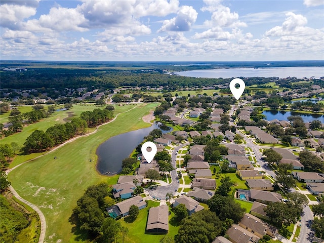 9563 Myrtle Creek Ln, Orlando, FL 32832 - aerial view of residential area with a nearby body of water and a golf club