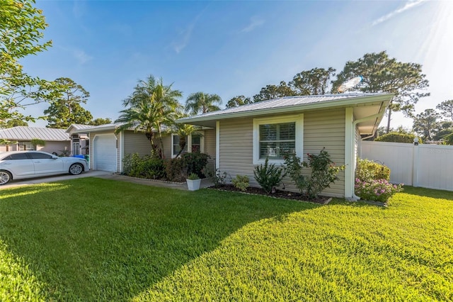 1566 Damask Ln, Sebastian, FL 32958 - ranch-style home featuring a garage and metal roof