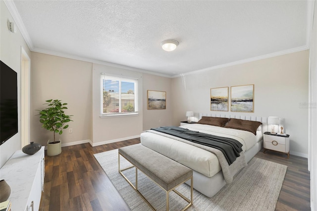 1948 Conway Rd Unit 8, Orlando, FL 32812 - bedroom featuring crown molding, dark wood-style floors, baseboards, and a textured ceiling