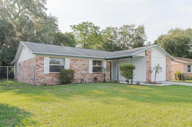 635 San Lanta Cir, Sanford, FL 32771 - view of front of house with concrete driveway, brick siding, and an attached garage