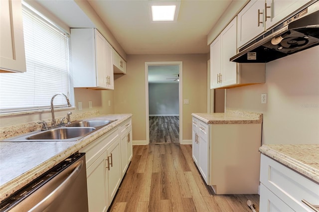 635 San Lanta Cir, Sanford, FL 32771 - kitchen with stainless steel dishwasher, a sink, under cabinet range hood, light countertops, and light wood-style floors