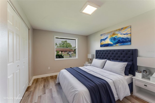 635 San Lanta Cir, Sanford, FL 32771 - bedroom featuring wood finished floors and baseboards