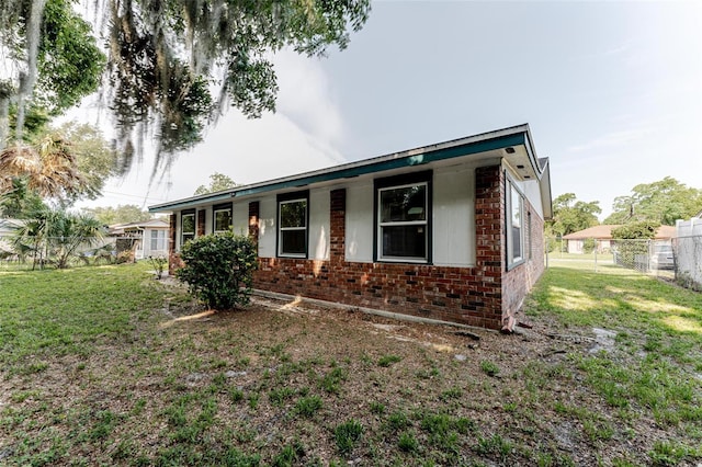 635 San Lanta Cir, Sanford, FL 32771 - ranch-style home with brick siding