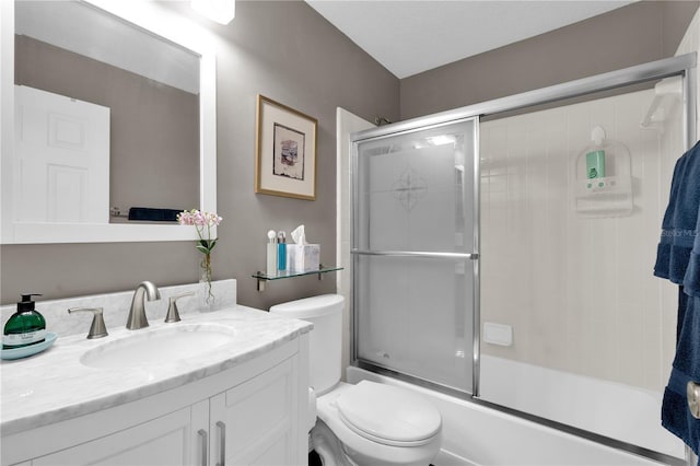 5395 Dover Village Ln Unit 305, Orlando, FL 32812 - bathroom featuring toilet, vanity, and bath / shower combo with glass door