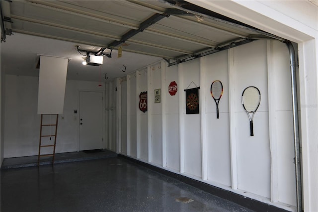 5395 Dover Village Ln Unit 305, Orlando, FL 32812 - garage featuring a garage door opener