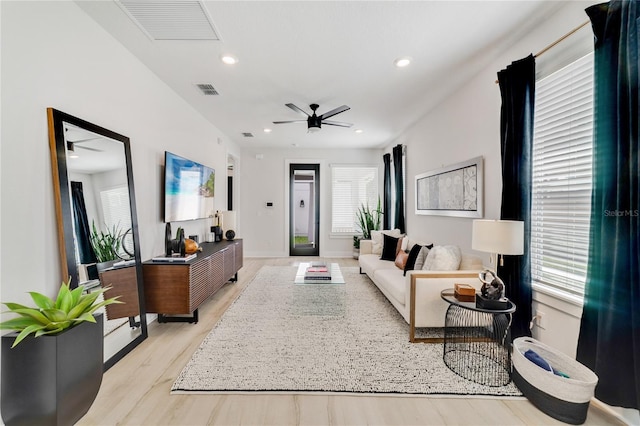 2110 Hillcrest St, Orlando, FL 32803 - living area with a ceiling fan, light wood-type flooring, and recessed lighting